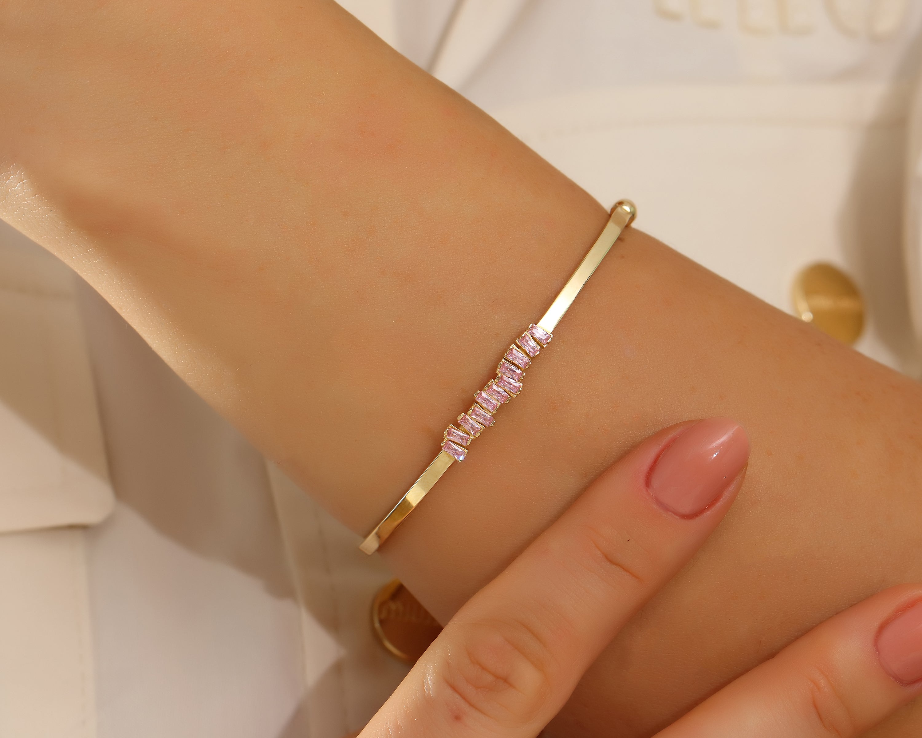 Shop solid gold bangles and bracelets in 10K, 14K and 18K gold. Twisted, floral, diamond-set and minimalist styles. Elegant gifts for her.